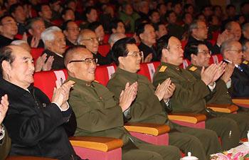 Hu Jintao (C), General Secretary of the Communist Party of China (CPC) Central Committee, Chinese President, and Chairman of the Central Military Commission (CMC), attends the performances by the CMC for old comrades and retired cadres of the army in Beijing, capital of China, Jan. 28, 2008. Hu extended greetings to old comrades and retired cadres of the army, wishing them all good health and a happy Spring Festival. (Xinhua Photo)