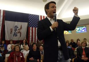 U.S. Democratic Presidential candidate and former Senator John Edwards (D-NC) shakes his fist as he campaigns at the Friendship Haven Celebration Center in Fort Dodge, Iowa January 1, 2008.(Xinhua/Reuters File Photo)