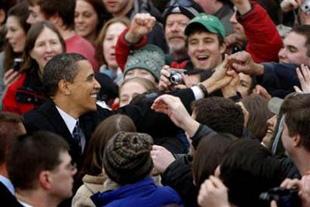 Democratic presidential candidate Senator Barack Obama (D-IL) greets supporters outside the Bangor Auditorium during a campaign rally in Bangor, Maine Feb. 9, 2008. (Xinhua/Reuters Photo)