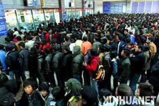A tidal wave of passengers began to hit China's eastern railways.