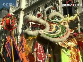Led by dragon and lion dancers, more than 20 performing teams drew huge crowds as they toured the major streets in Paris.