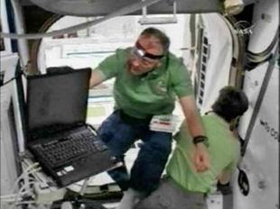 Astronaut Hans Schlegel (L) of Germany is seen inside the European Space Agency's Columbus module along with International Space Station Commander Peggy Whitson (R) shortly after the hatch was opened for the first time to the latest addition to the station in this image from NASA TV February 12, 2008. [Agencies]