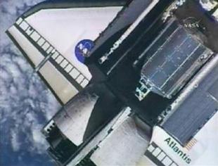 The European Space Agency Columbus laboratory module is seen inside the Space Shuttle Atlantis' cargo bay in this view from a camera aboard the International Space Station and shown on NASA TV as the shuttle approaches the space station for docking February 9, 2008. REUTERS/NASA