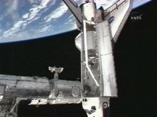 In this image taken from video provided by NASA TV, the space shuttle Atlantis is seen after docking with the International Space Station, Saturday, Feb. 9, 2008. (AP Photo/NASA)