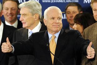 Arizona Senator and U.S. Republican presidential hopeful John McCain (C) makes thumb-up sign as he celebrates winning the contests in Potomac Primary, at Alexandria, VA, on Feb. 12, 2008. McCain beat his opponent during the presidential nomination contests held in the so-called "Potomac primaries" on Tuesday -- named for the river that separates Virginia and Maryland and flows past the nation's capital.(Xinhua Photo)