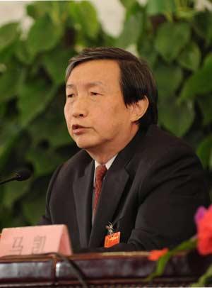 Ma Kai, Chinese minister of National Development and Reform Commission, answers a question from journalists during a press conference on economic and social development and macroeconomic regulation held by the First Session of the 11th National People's Congress (NPC) at the Great Hall of the People in Beijing, capital of China, March 6, 2008. (Xinhua Photo)