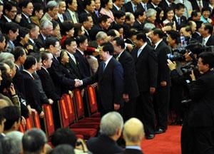 Chinese President Hu Jintao (C) meets with deputies to the First Session of the 11th National People's Congress (NPC) as well as members of the 11th National Committee of the Chinese People's Political Consultative Conference (CPPCC) from China's Hong Kong Special Administrative Region (SAR) and Macao SAR at the Great Hall of the People in Beijing, capital of China, March 6, 2008.(Xinhua Photo)
