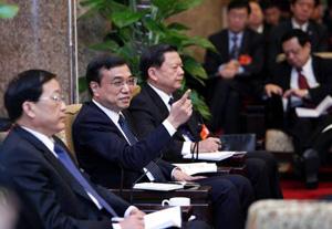 Joining lawmakers from Liaoning Province, Li Keqiang said that improving people's livelihood is crucial to building a harmonious society. The government should provide the public goods more effectively, so that all Chinese citizens can share the fruits of reform and development. (Xinhua Photo)