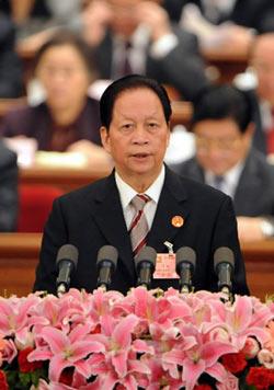 The President of the Supreme People's Court Xiao Yang delivers a work report of the Supreme People's Court during the third plenary meeting of the First Session of the 11th National People's Congress (NPC) at the Great Hall of the People in Beijing, March 10, 2008. (Xinhua/Li Xueren)