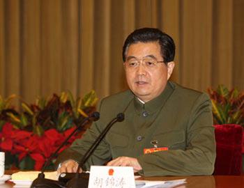 Chinese President Hu Jintao, who is also general secretary of the Communist Party of China (CPC) Central Committee and chairman of the Central Military Commission, talks to the deputies of the Chinese People's Liberation Army (PLA) to the First Session of the 11th National People's Congress (NPC) in Beijing, capital of China, March 10, 2008. Hu Jintao attended the plenary meeting of the PLA delegation and made a speech on Monday.(Xinhua Photo)