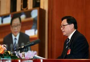 State Councilor Hua Jianmin, who is also Secretary General of the State Council, delivers the explanation of the plan for institutional restructuring of the State Council during the fourth plenary meeting of the First Session of the 11th National People's Congress (NPC) at the Great Hall of the People in Beijing, capital of China, March 11, 2008. (Xinhua Photo)