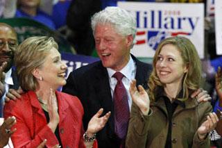 U.S. Democratic presidential candidate Senator Hillary Clinton (D-NY) (L), former President Bill Clinton (C) and their daughter Chelsea Clinton applaud on stage during a rally in Philadelphia, Pennsylvania, April 21, 2008. (Xinhua/Reuters Photo)
