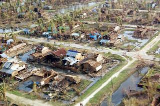 Photo taken on May 7, 2008 shows an aerial view of a badly stricken village in Irrawaddy, Myanmar. International relief aid from Japan, Bangladesh, Laos, China, Thailand, India and Singapore has been poured in Myanmar till Wednesday for the country's storm victims, according to Myanmar's state radio, and there will be more in future. Cyclone Nargis hit Myanmar on May 2 and 3 leaving about 22,000 people dead and 41,000 missing. (Xinhua/Burma News Agency)