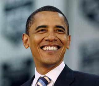 U.S. Democratic presidential candidate Senator Barack Obama (D-IL) smiles during a town hall-style meeting at Troy High School in suburban Detroit, June 2, 2008. (Xinhua/Reuters Photo)