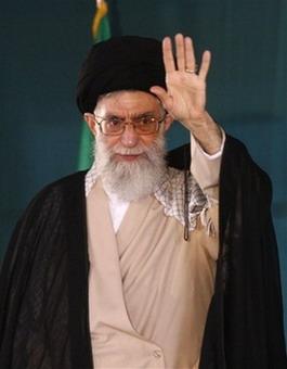 Iranian supreme leader Ayatollah Ali Khamenei waves to the crowd at the conclusion of his speech in a ceremony marking 19th death anniversary of Iranian late revolutionary founder Ayatollah Khomeini, at his mausoleum just outside Tehran, Iran, Tuesday, June 3, 2008. Khamenei said Tuesday his country will continue with its controversial nuclear program, but rejected nuclear weapons. 'Iran is after the peaceful use of nuclear energy and we will strongly pursue and reach it despite the envy of our enemies,' he said.(AP Photo/Vahid Salemi)