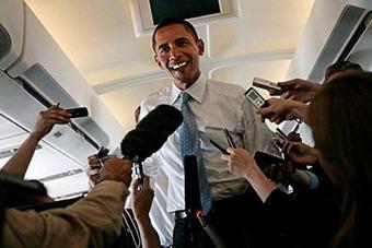 Democratic presidential hopeful Sen. Barack Obama answers questions from reporters in the airplane en route to a rally in Bristow, Virginia.(AFP/Getty Images/Chip Somodevilla) 