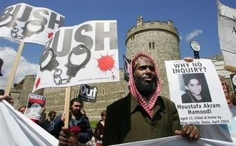 Members of the 'Stop the War Coalition' protest outside Windsor Castle during US President George W. Bush's visit in Windsor. Bush arrived in Britain for talks with Prime Minister Gordon Brown on Iran and other issues, as both sides vigorously denied any rift over troop levels in Iraq.(AFP/Geoff Caddick)