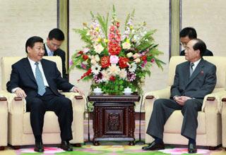 Chinese Vice President Xi Jinping (L) talks with Kim Yong Nam, president of the Presidium of the Supreme People's Assembly of the Democratic People's Republic of Korea (DPRK), during a meeting in Pyongyang, the DPRK, on June 17, 2008. (Xinhua/Pang Xinglei)