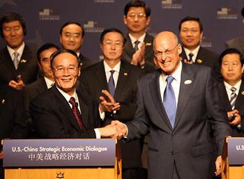 Visiting Chinese Vice Premier Wang Qishan (front L) shakes hands with U.S. Treasury Secretary Henry Paulson (front R) at the opening ceremony of the 4th round of China-U.S. Strategic Economic Dialogue in Annapolis, Maryland, the United States of America, June 17, 2008. China and the United States on Tuesday started here their 4th round of Strategic Economic Dialogue. (Xinhua/Yao Dawei)