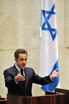 French President Nicolas Sarkozy delivers a speech at the Israeli Parliament in Jerusalem. Sarkozy called on Monday for a halt to Jewish settlement activity in the occupied West Bank while also proclaiming staunch support for Israel in an address to its parliament.(AFP/Pool/Eric Feferberg)