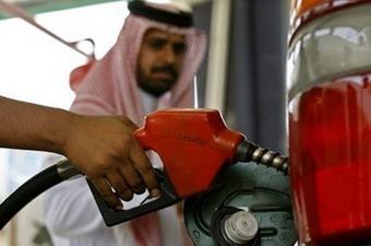 A car is filled up at a petrol station in Jeddah on June 21. Saudi King Abdullah launched an offensive against "speculators" at a summit on Sunday on the soaring price of crude that called for greater transparency in oil market dealings.(AFP/File/Hassan Ammar) 