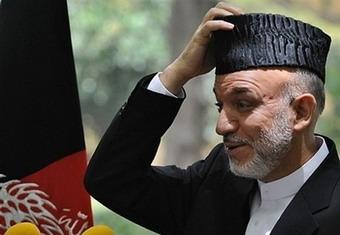 Pakistan on Thursday rejected Afghan claims that its main spy service masterminded an attempt to kill President Hamid Karzai, heightening tensions between the two allies in the "war on terror."(AFP/File/Shah Marai)