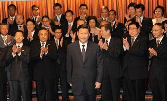 Chinese Vice President Xi Jinping (C) meets with principal administrative, legislative and judiciary officials of the Hong Kong Special Administrative Region (HKSAR) in Hong Kong, south China, July 7, 2008. (Xinhua/Huang Jingwen)