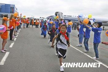 More than 300 teenagers from China's quake-hit provinces have arrived at the 