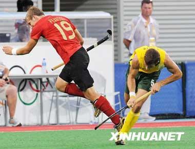 Canada beat South Africa 5-3 in men's Olympic hockey tournament, Aug.19. A Canadian athlete (left) forms forms a 