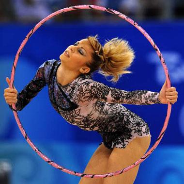 Eleni Andriola of Greece competes during the hoop contest of individual all-around qualification of Beijing Olympic Games gymnastics rhythmic event in Beijing, China, Aug. 21, 2008.(Xinhua/Cheng Min)