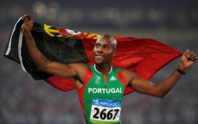 Nelson Evora of Portugal celebrates after the men's triple jump final at the National Stadium, also known as the Bird's Nest, during Beijing 2008 Olympic Games in Beijing, China, Aug. 21, 2008. Nelson Evora won the gold with 17.67 metres. (Xinhua)