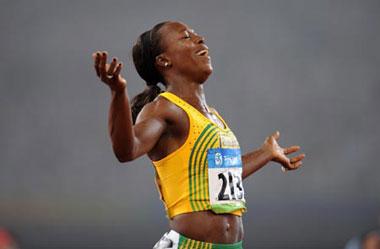 Veronica Campbell-Brown of Jamaica jubilates after winning the women's 200m final at the National Stadium, also known as the Bird's Nest, during Beijing 2008 Olympic Games in Beijing, China, Aug. 21, 2008. (Xinhua Photo)