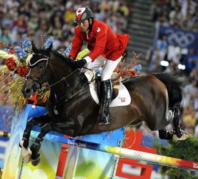 Eric Lamaze of Canada rides with "Hickstead" in the equestrian jumping individual competition in Hong Kong on August 21, 2008 during the 2008 Beijing Olympic Games.