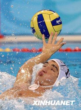 Aug.22 -- Hungarian athlete competing in the water polo event. Hungary scored a come-from-behind 11-9 victory over Montenegro. (Xinhua)