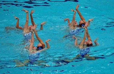 Russian synchronized swimming team perform during the team event free routine at the Beijing 2008 Olympic Games synchronized swimming event in Beijing, China, Aug. 23, 2008. Russian team won the gold medal in synchronized swimming team event. (Xinhua/Wang Dingchang)
