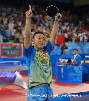 Ma Lin of China celebrates in Men's Singles Gold Medal Match between Wang Hao and Ma Lin of China of Beijing 2008 Olympic Games table tennis event at PKU Gymnasium in Beijing, China, Aug. 23, 2008. Ma Lin defeated Wang Hao 4-1, and won the gold medal of the event. (Xinhua)