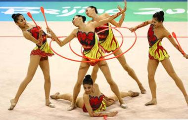 The team of China compete in the 3 hoops and 2 clubs contest of the group all-around final of Beijing Olympic Games gymnastics rhythmic event in Beijing, China, Aug. 24, 2008. China won the silver medal in the group all-around final.(Xinhua Photo)