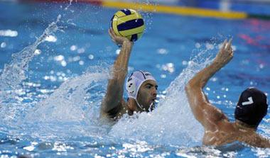 Tamas Varga of Hungary shoots during men's water polo gold medal match at the Beijing Olympic Games in Beijing, China, Aug. 24, 2008. Hungary defeated the United States and won the gold.(Xinhua/Guo Lei)