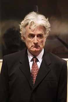 Former Bosnian Serb leader Radovan Karadzic attends a hearing at the United Nations tribunal in The Hague August 29, 2008. (Xinhua/AFP Photo)