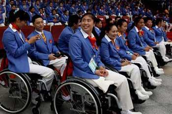 Athletes of the Chinese delegation attend the opening ceremony of the Paralympic village in Beijing, China, Aug. 30, 2008. The Paralympic village officially opened to athletes from all over the world on Saturday for the Beijing Paralympic Games.(Xinhua Photo)