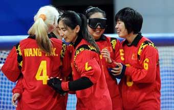 Hosts China snatches their first win in the 2008 Paralympic women's goalball preliminaries at the Beijing Institute of Technology Gymnasium on Sunday, beating Brazil 5-3. [Xinhua]