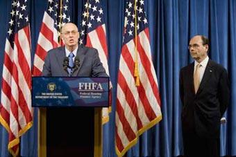Secretary of the Treasury Henry Paulson (L) and Jim Lockhart, Director of the the new independent regulator, the Federal Finanace Agency (FHFA), announce that the government is taking control of mortgage finance companies Fannie Mae and Freddie Mac during a news conference at the Office of Management Supervision in Washington, DC, Sept. 7, 2008.(Xinhua/Reuters Photo)