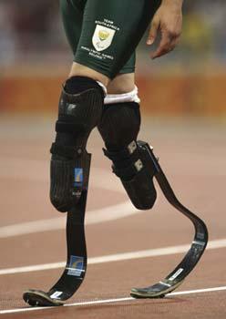 The prosthetic legs of South Africa's Oscar Pistorius can be seen after he ran his heat of the Men's 100M T44 at the National Stadium, also known as the Bird's Nest, during the Paralympics in Beijing September 8, 2008. [Agencies]