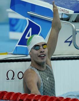 Daniel Dias of Brazil celebrates after winning the men's 100m freestyle S5 final during the 2008 Beijing Paralympic Games at the National Aquatics Center in Beijing on September 7, 2008. [Agencies]