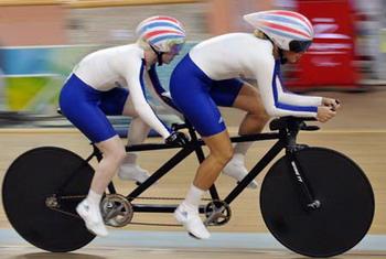 Aileen McGlynn(L) and her pilot Ellen Hunter of Great Britain competes during women's individual pursuit(B&VI) final of the Beijing 2008 Paralympic Games cycling track event on Sept. 9, 2008. The British duet won gold medal in the event with 3 min 39.809 secs.(Xinhua/Wang Lei)