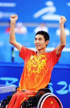 Feng Panfeng of China celebrates after he won the men's individual class 3 gold medal match against Jean-Philippe Robin of France at the Beijing 2008 Paralympic Games table tennis event in Beijing, China, Sept. 11, 2008. Feng Panfeng won the match 3-0 and claimed the title.(Xinhua Photo)