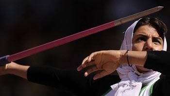 Safia Djelal of Algeria prepares to throw the javalin in the final of the women's Javalin F57/58 event during the 2008 Beijing Paralympic Games at the National Stadium in the Chinese capital on September 11, 2008.