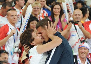Branimir Budetic of Croatia shares a moment with his mother after finishing second during the final of the men's javelin F11-12 classification event at the 2008 Beijing Paralympic Games in Beijing on September 10, 2008.