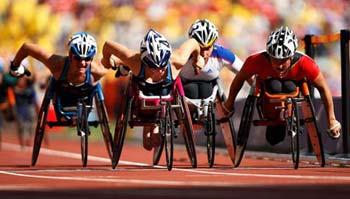 Amanda Mcgrory (L2) of the United States and Diane Roy (R) of Canada compete during the women's 5000m-T54 final at the National Stadium，also known as the Bird's Nest，during the Beijing 2008 Paralympic Games in Beijing, China, Sept. 12, 2008. Amanda Mcgrory claimed the title with 12 min 29.07 secs. Diane Roy got the silver. (Xinhua Photo)