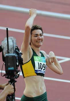 Lisa Mcintosh of Australia celebrates after winning the women's 100m-T37 final at the National Stadium，also known as the Bird's Nest，during the Beijing 2008 Paralympic Games in Beijing, China, Sept. 12, 2008. Mcintosh claimed the title with 14.14 secs. (Xinhua Photo)